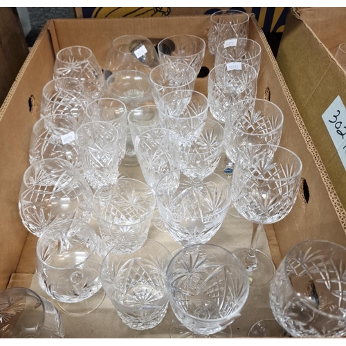 297 - Two boxes of assorted glassware: decanters: wine glasses liqueur glasses, fruit bowl, vases etc. (2)... 