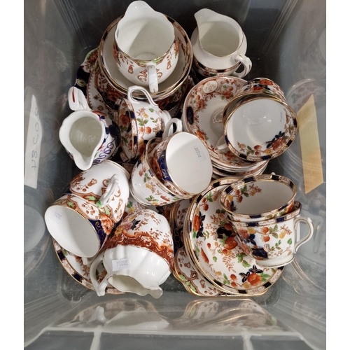 302 - Plastic box comprising early 20th century floral tea ware.  (B.P. 21% + VAT)