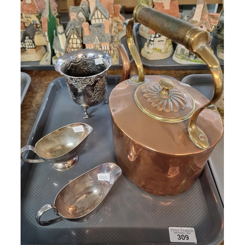 309 - Small tray of metalware to include: Victorian brass and copper teapot, two similar cream jugs and a ... 