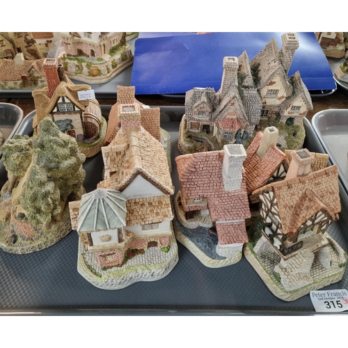 315 - Collection of David Winter buildings and cottages including: Casterton Railway Station, Witch's Cast... 