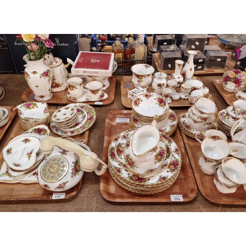 334 - Nine trays of mainly Royal Albert 'Old country Roses' design tea ware and other items including: vas... 