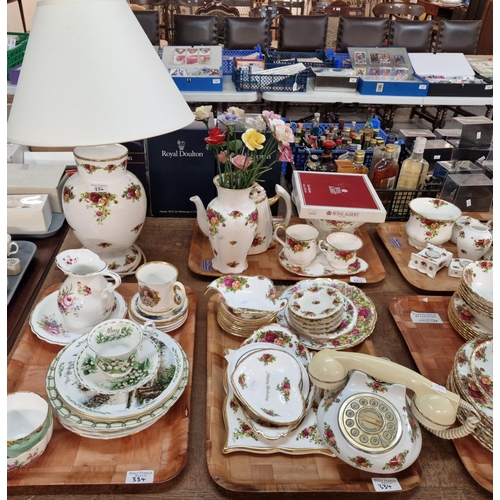 334 - Nine trays of mainly Royal Albert 'Old country Roses' design tea ware and other items including: vas... 