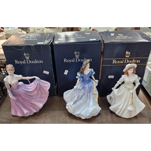 341 - Three Royal Doulton bone china figurines to include: 'Jacqueline', Figure of the Year 1998 'Rebecca'... 