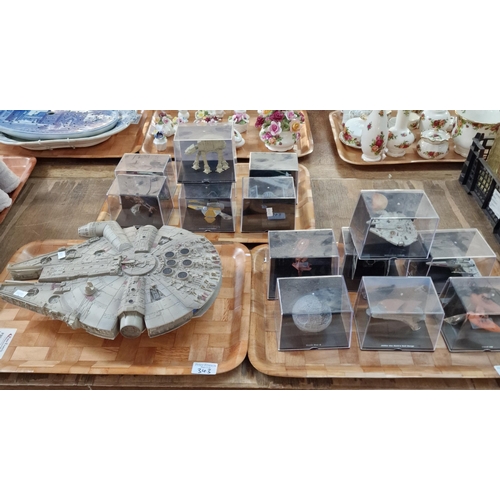 343 - Collection of modern Star Wars vehicles in perspex display cases to include: Millennium Falcon, Jabb... 