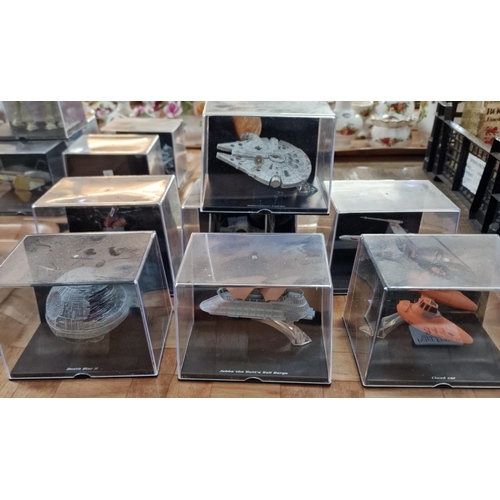 343 - Collection of modern Star Wars vehicles in perspex display cases to include: Millennium Falcon, Jabb... 