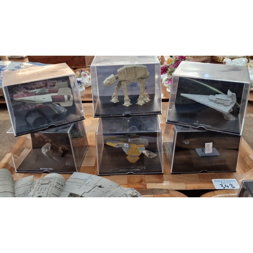 343 - Collection of modern Star Wars vehicles in perspex display cases to include: Millennium Falcon, Jabb... 