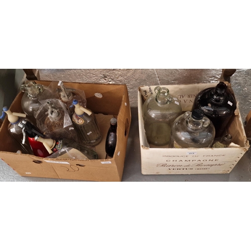 354 - Three boxes of glass demijohns and other glass bottles, together with some vintage Schweppes and oth... 