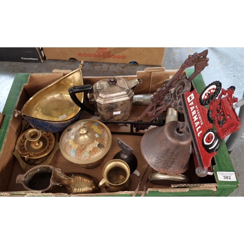 382 - Box of oddments to include: modern cast metal bell on bracket marked McCormick Farmall, silver plate... 