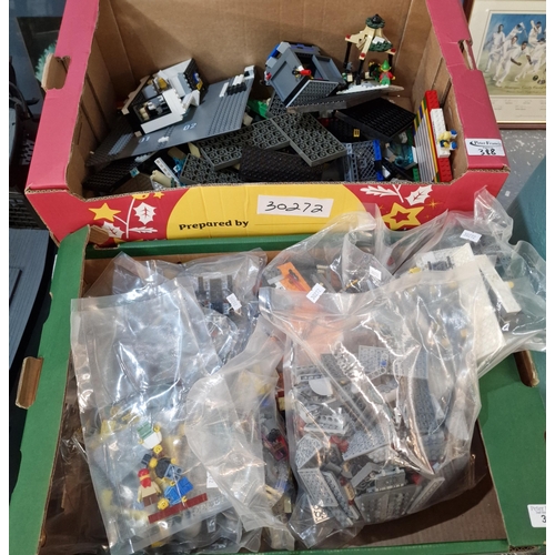 388 - Two boxes of assorted Lego to include: figures, buildings etc. (B.P. 21% + VAT)