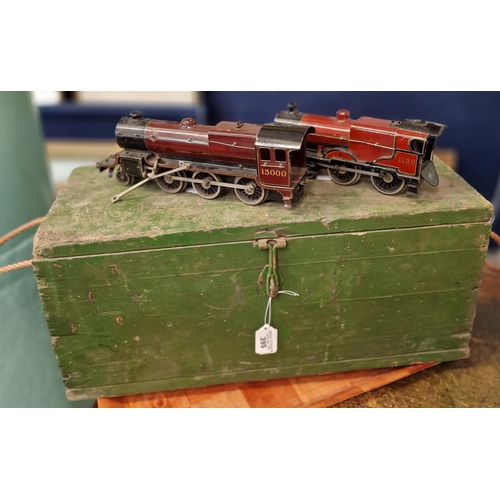 395 - Two similar vintage O gauge tin plate locomotives marked 1190 and 13000. Together with a painted gre... 