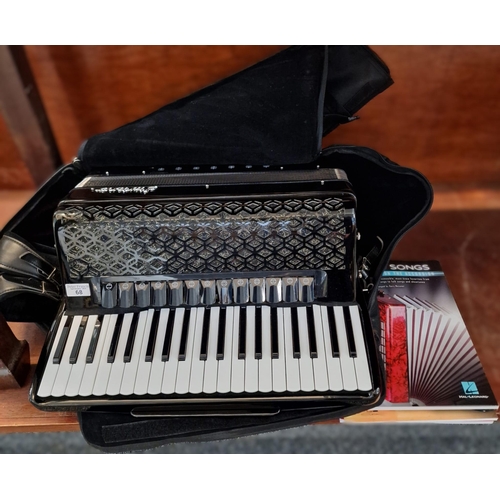 68 - Modern 'Startone' Accordion in fitted case with a variety of accordion music books.  (B.P. 21% + VAT... 