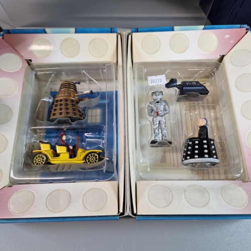 71 - Collection of Doctor Who Tardis with assorted miniature figurines from the series, in original case ... 