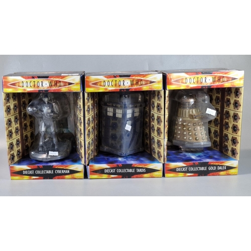 73 - Three Doctor Who diecast collectable toy figures/items in original boxes to include: Cyberman, Tardi... 