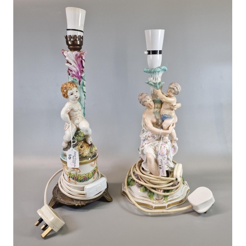 10 - A Continental porcelain table lamp in the form of a semi-nude lady with child together with a Capodi... 