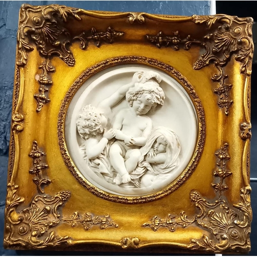 108 - Reproduction relief plaque featuring cherubs, in heavy gilt frame. Modern. 16cm diameter approx. (B.... 