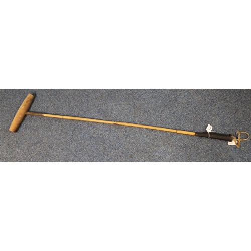 143 - A vintage wooden polo stick. (B.P. 21% + VAT)