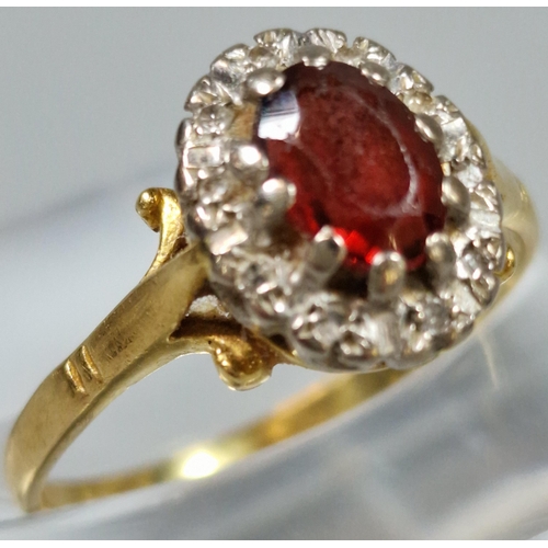 182 - Yellow metal diamond and ruby cluster ring. Indistinct and rubbed hallmarks, illegible. 3.5g approx.... 