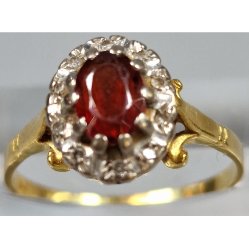 182 - Yellow metal diamond and ruby cluster ring. Indistinct and rubbed hallmarks, illegible. 3.5g approx.... 