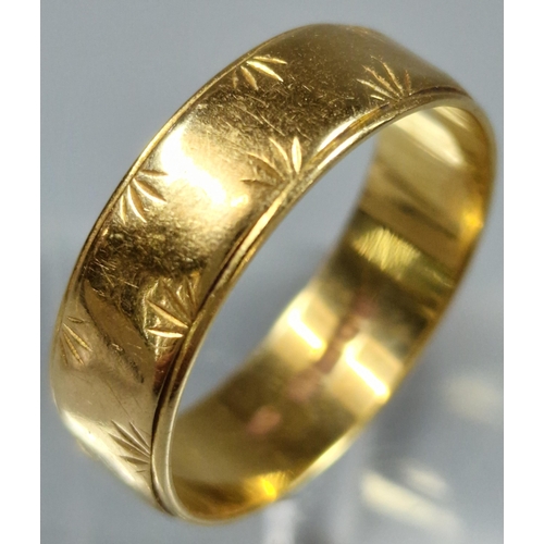 183 - 18ct gold engraved wedding band. 4.2g approx. Ring size O 1/2. (B.P. 21% + VAT)