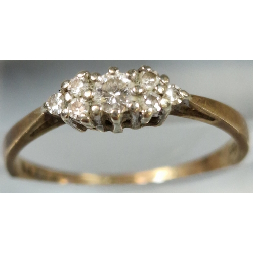 186 - 9ct gold diamond seven stone ring. 1.2g approx. Ring size K 1/2. (B.P. 21% + VAT)