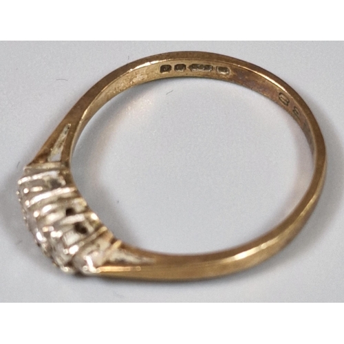 186 - 9ct gold diamond seven stone ring. 1.2g approx. Ring size K 1/2. (B.P. 21% + VAT)