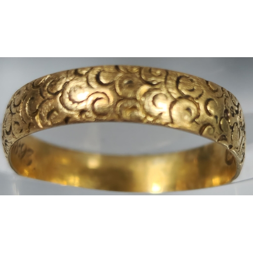 192 - 18ct gold engraved wedding band. 1.8g approx. Ring size L 1/2. (B.P. 21% + VAT)