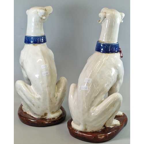 2 - Pair of probably Italian ceramic seated fireside whippets/lurcher dogs. Unmarked. Both approx. 35cm ... 