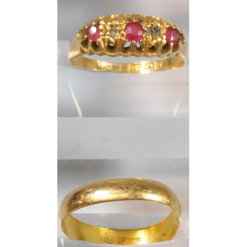 200 - Yellow metal wedding band. 1.8g approx. Ring size J 1/2. Together with an 18ct diamond and ruby ring... 