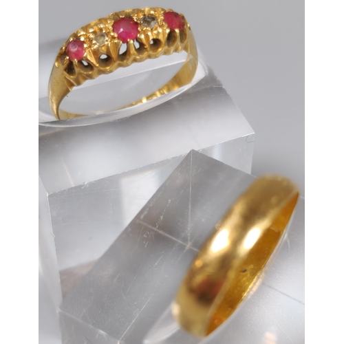 200 - Yellow metal wedding band. 1.8g approx. Ring size J 1/2. Together with an 18ct diamond and ruby ring... 