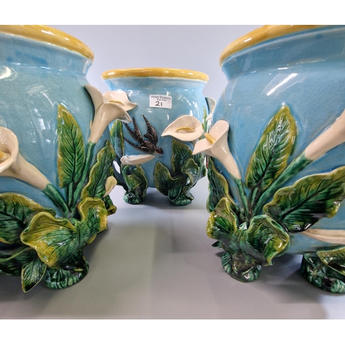 21 - In the style of George Jones, a set of three Majolica jardinières of globular form supported on four... 