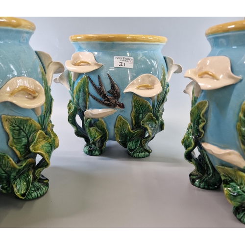 21 - In the style of George Jones, a set of three Majolica jardinières of globular form supported on four... 