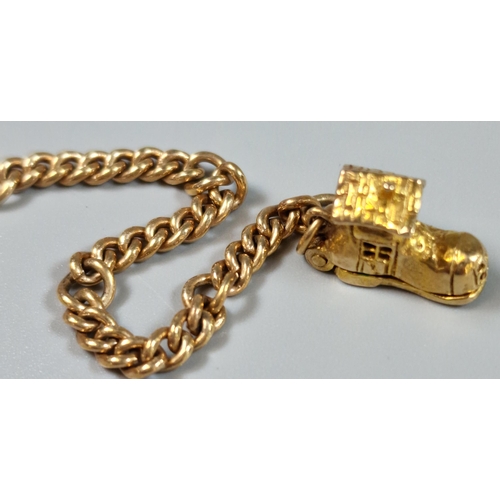 216 - 9ct gold bracelet with boot charm. 9.5g approx. (B.P. 21% + VAT)