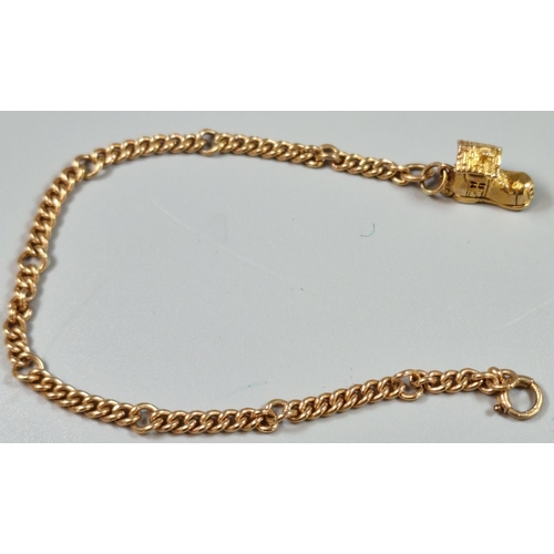 216 - 9ct gold bracelet with boot charm. 9.5g approx. (B.P. 21% + VAT)