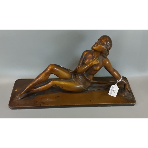 23 - After Bacci & Bacci, a 1930's Art Deco plaster figure of a reclining semi-clad lady on rectangular b... 