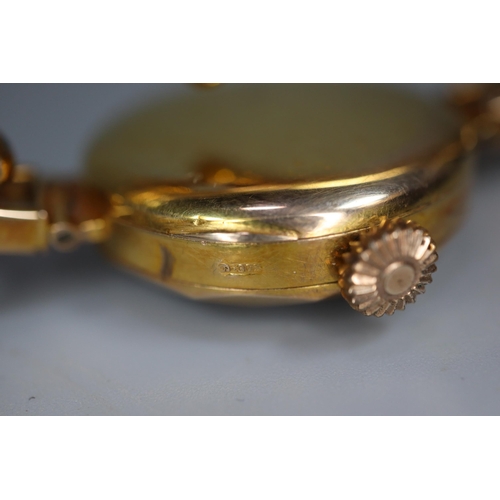 234 - 9ct gold ladies' bracelet wristwatch. Total weight 18.3g approx. (B.P. 21% + VAT)