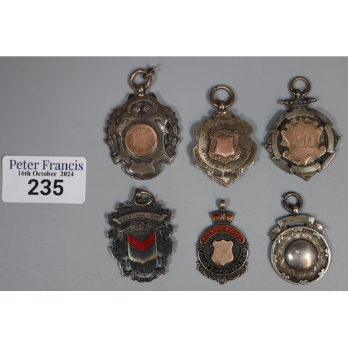 235 - A collection of silver sporting / football fobs. 3.3 troy oz approx. (B.P. 21% + VAT)