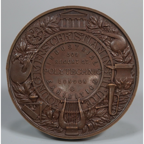 237 - A heavy bronze 19th century medallion marked 'Young Men's Christian Institution' and the 'Lord is Ou... 