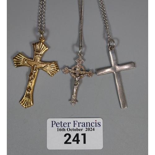 241 - A collection of silver and silver gilt crucifix pendants and chains. (B.P. 21% + VAT)