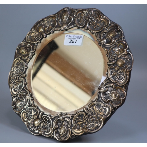 257 - Edward VII silver easel bevelled dressing table mirror, repousse decorated with fruits and foliage. ... 