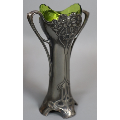 260 - A pair of Art Nouveau pewter Epergne two-handled vases with green glass liners. Unmarked. Height app... 