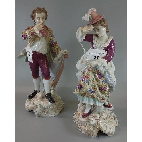 37 - A pair of late 19th century German Dresden Volkstedt figures in 18th century dress on Rococo design ... 