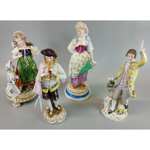 38 - A collection of German and other porcelain figures and figure groups to include: Sitzendorf study of... 