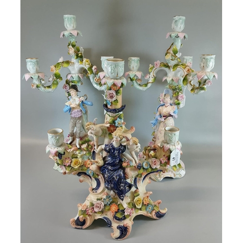 41 - A pair of Sitzendorf German porcelain table candelabra depicting 18th century figures with ornately ... 