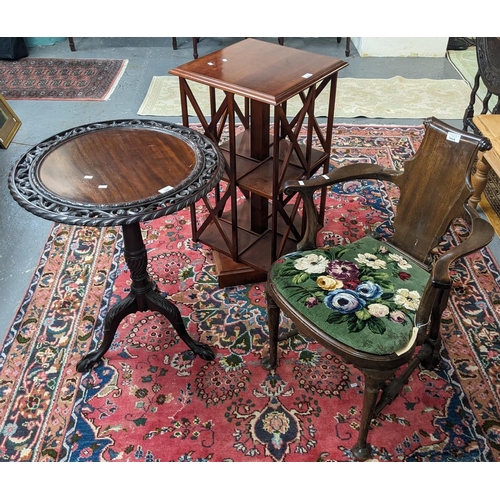 449 - 18th century mahogany snap top circular tripod table with foliate pierced edge on gun barrel pedesta... 