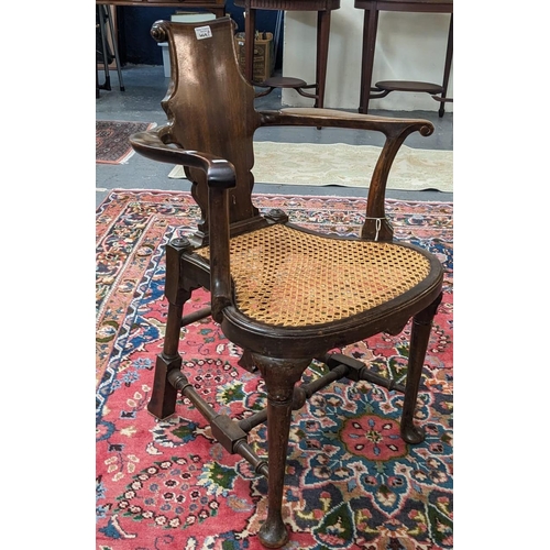 449A - 18th century style mahogany scrolled splat back elbow chair with bow fronted cane seat on moulded ca... 