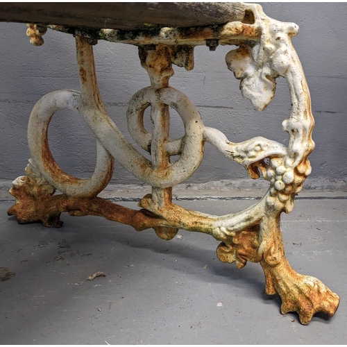 454 - Cast iron garden bench with hounds head terminals and snake designs, having wooden slats. Probably 1... 