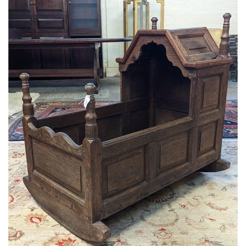 460 - Traditional Welsh 18th century style oak rocking crib. 93cm long x 65cm wide approx. (B.P. 21% + VAT... 