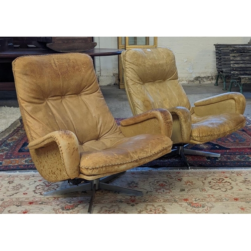 464 - Pair of 1960's or 70's leather designer pedestal, 'James Bond' chairs, probably by De Sede. (Sold as... 