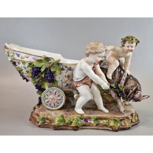 7 - A Continental, probably German, porcelain figure group centrepiece of cherubs and mythical creature ... 