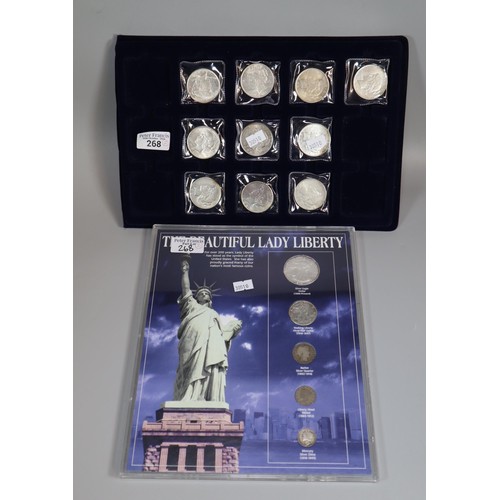 268 - Collection of ten silver USA one dollar coins together with 'The Beautiful Lady Liberty' five coin s... 